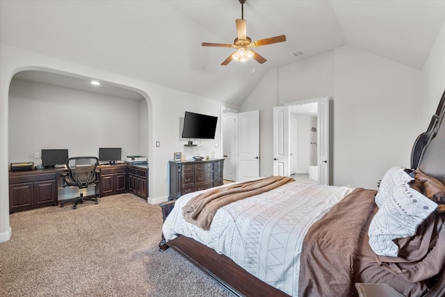 carpeted bedroom with vaulted ceiling and ceiling fan