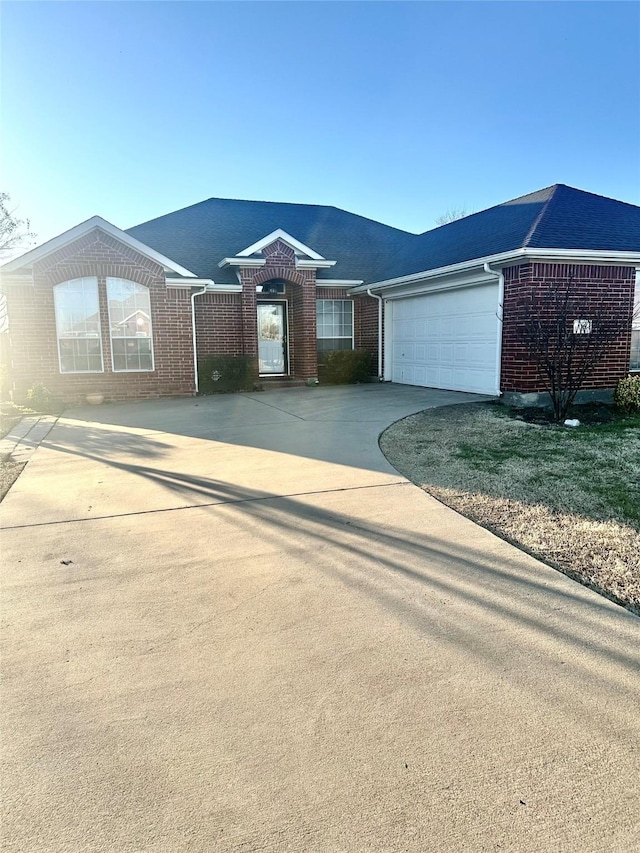 single story home with a garage