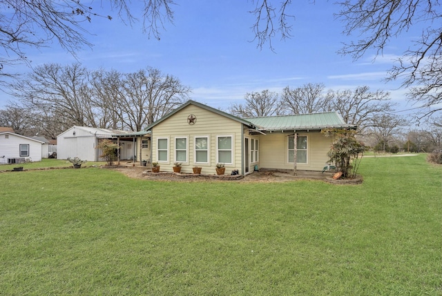 exterior space featuring a front lawn