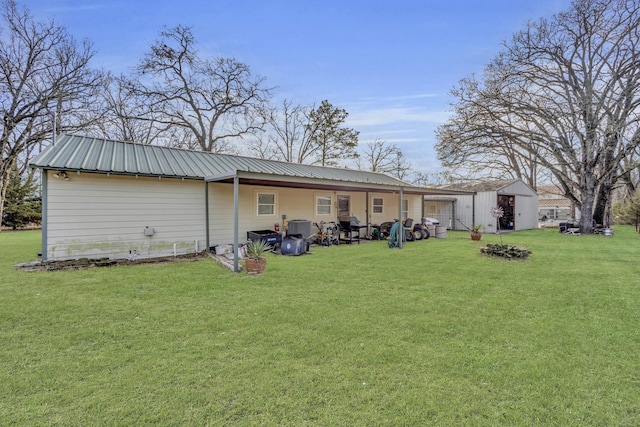 back of house with a yard