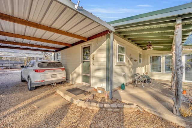 exterior space featuring a carport