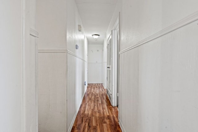 corridor featuring wood-type flooring