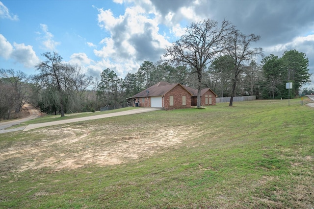 view of yard with a garage