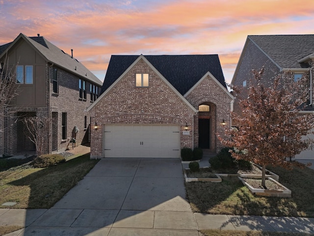 view of front of property featuring a garage