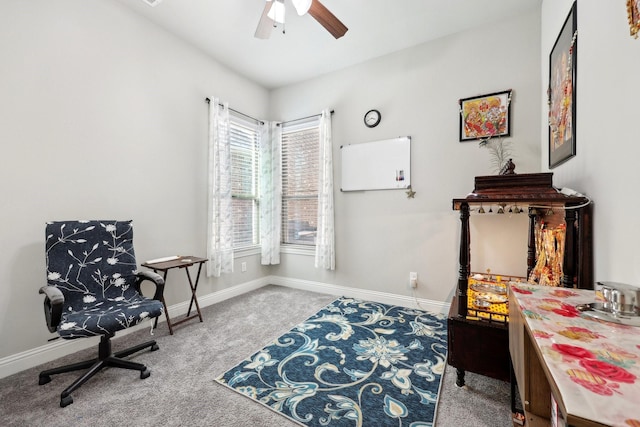 living area with ceiling fan and carpet floors