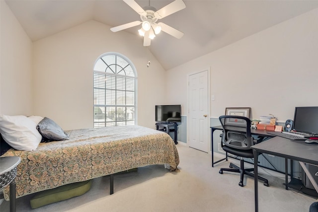 carpeted bedroom featuring ceiling fan and vaulted ceiling