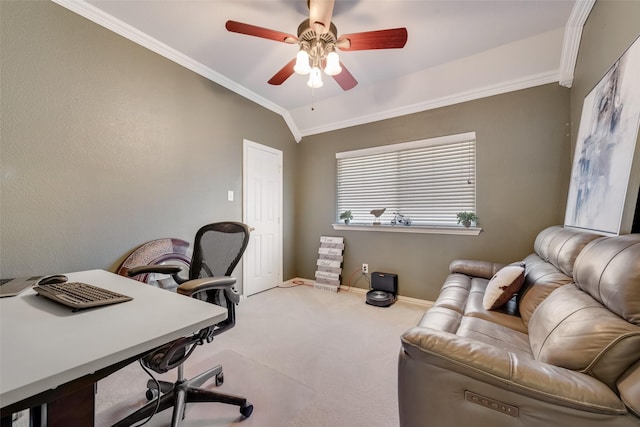 carpeted office featuring crown molding, lofted ceiling, and ceiling fan