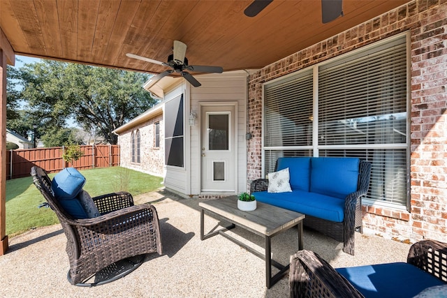 view of patio featuring an outdoor living space and ceiling fan