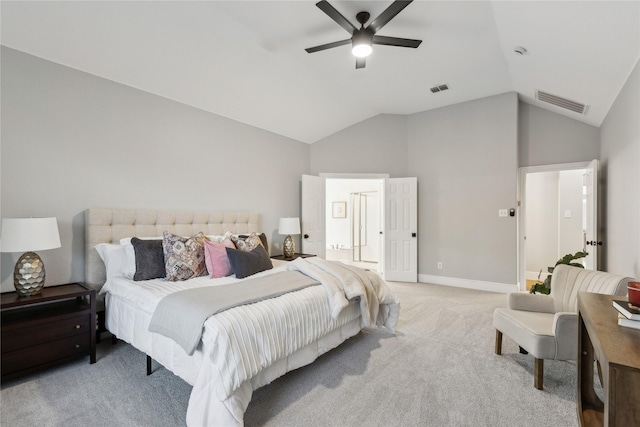 bedroom with ceiling fan, light colored carpet, and lofted ceiling