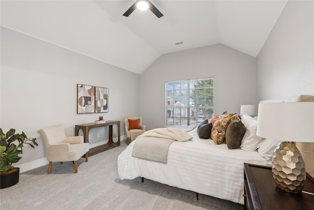 bedroom featuring ceiling fan, carpet floors, and vaulted ceiling