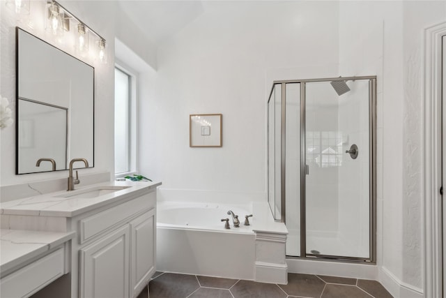 bathroom featuring vanity, tile patterned floors, and plus walk in shower