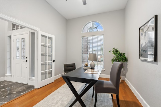 office space with hardwood / wood-style floors and ceiling fan