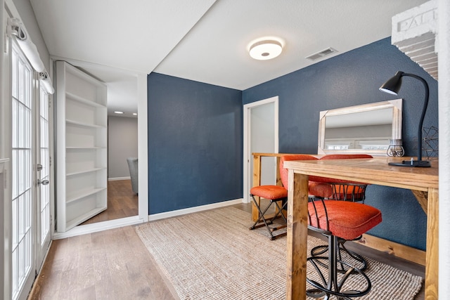 office area with hardwood / wood-style flooring