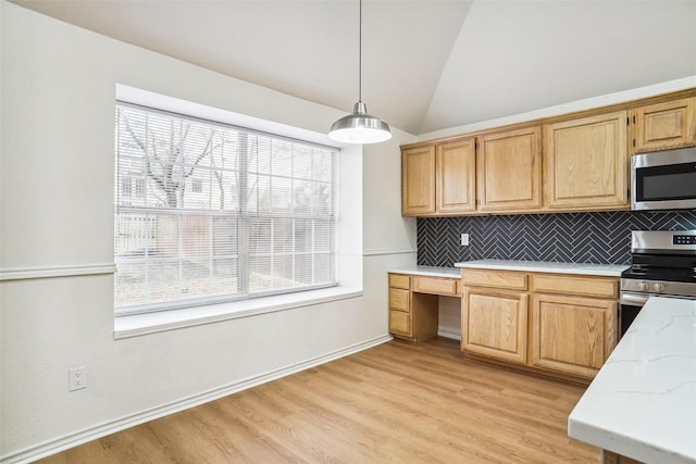 2324 Spring Mills Rd, Mesquite, TX 75181 - kitchen with tasteful backsplash, a wealth of natural light, vaulted ceiling, and stainless steel appliances