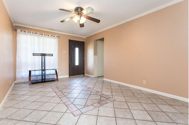 foyer entrance with ornamental molding, light tile patterned floors, and ceiling fan