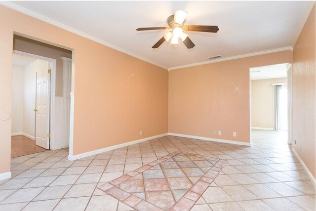 spare room with crown molding, light tile patterned floors, and ceiling fan