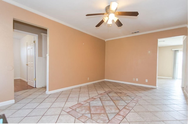 unfurnished room with ornamental molding, light tile patterned floors, and ceiling fan