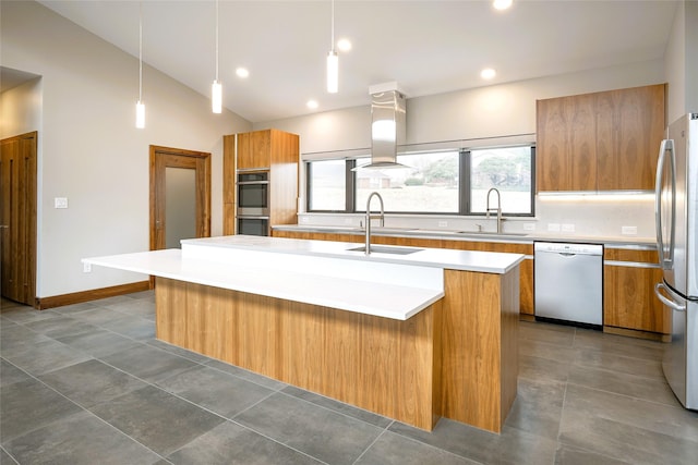 kitchen featuring appliances with stainless steel finishes, decorative light fixtures, ventilation hood, sink, and a center island