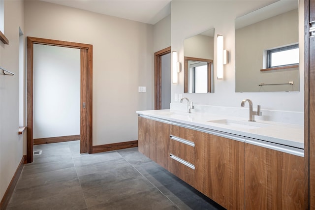 1621 Caddys Cir, Garland, TX 75043 - full bath with baseboards and double vanity