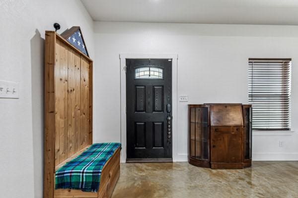 entrance foyer with concrete flooring