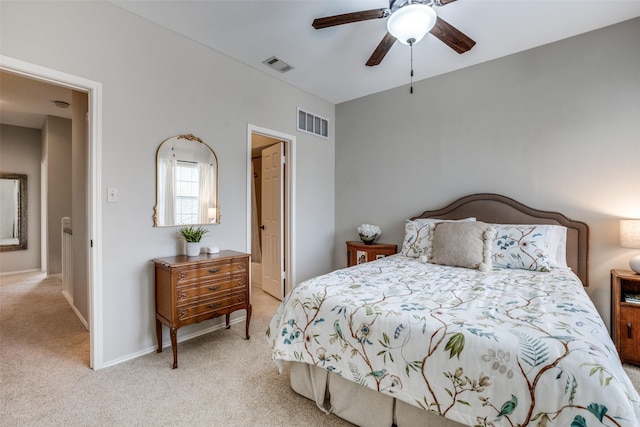 bedroom with light carpet and ceiling fan