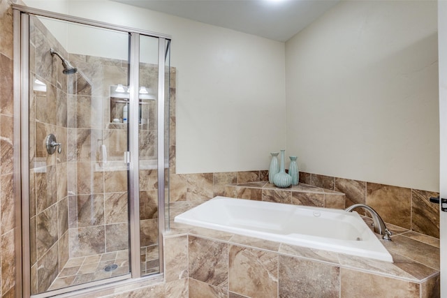 bathroom with shower with separate bathtub