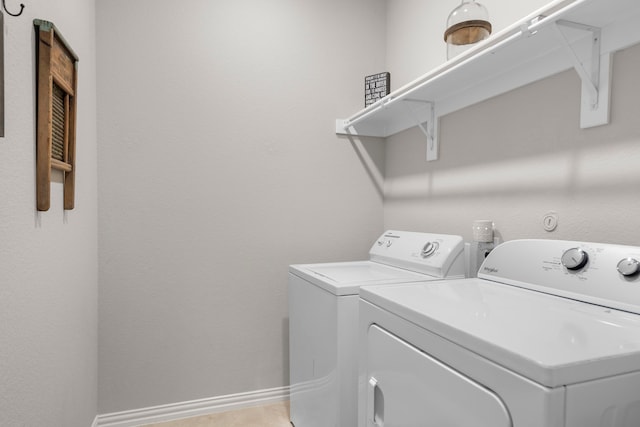 laundry room featuring separate washer and dryer