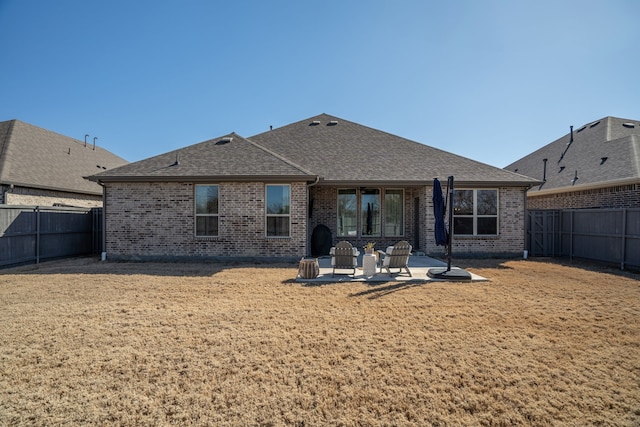 back of house with a patio area