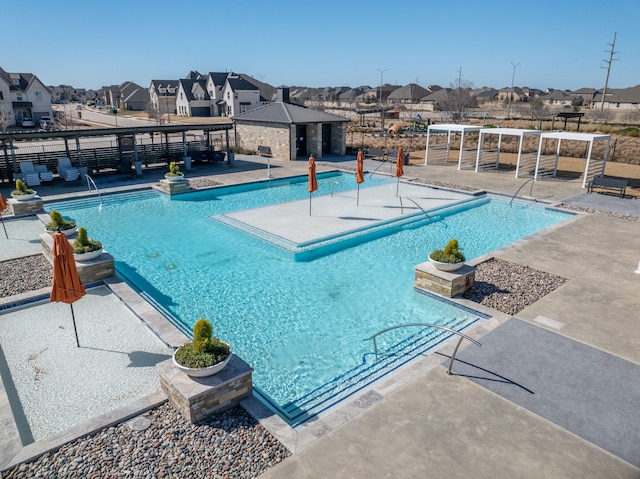 view of pool featuring a patio area