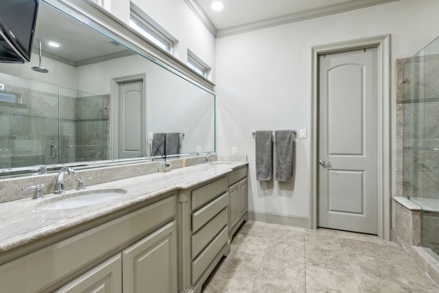 bathroom with vanity, crown molding, and walk in shower