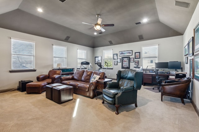 living room with ceiling fan, light colored carpet, and vaulted ceiling