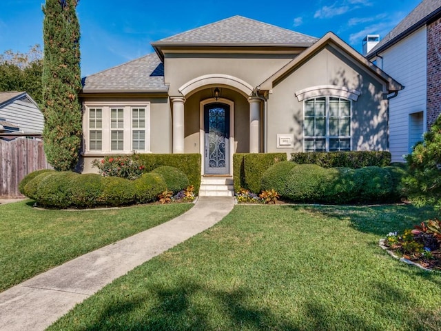 view of front facade with a front lawn