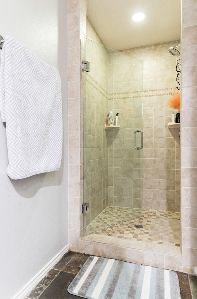 bathroom with an enclosed shower