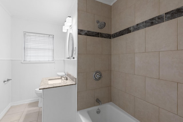 full bathroom with vanity, tiled shower / bath, tile patterned flooring, and toilet