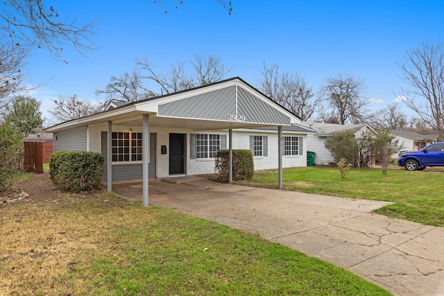 ranch-style house with a front lawn