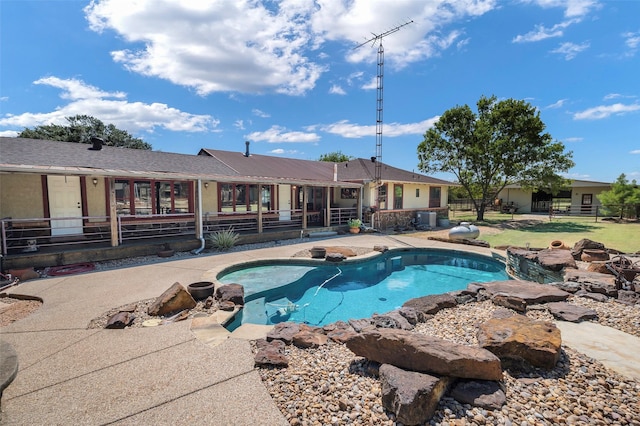 view of pool with a patio area