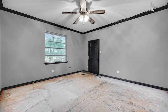 spare room featuring crown molding and ceiling fan