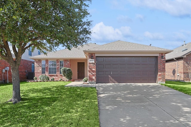 ranch-style home with cooling unit, a garage, and a front yard