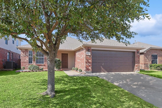 ranch-style house featuring central AC, a garage, and a front lawn