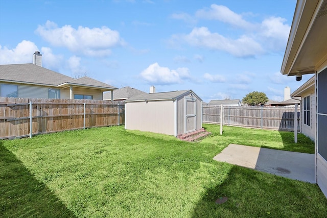 view of yard with a storage unit