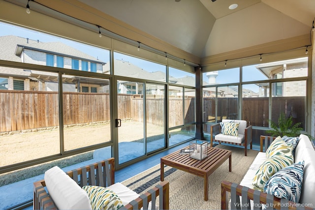 sunroom with lofted ceiling