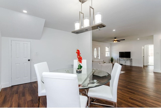 dining area featuring dark hardwood / wood-style floors and ceiling fan