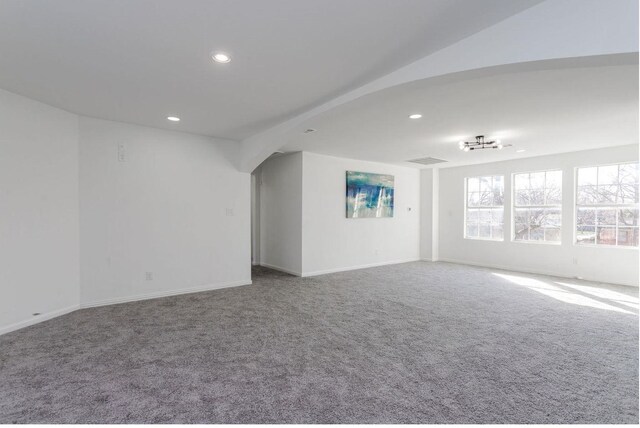 unfurnished room with carpet flooring