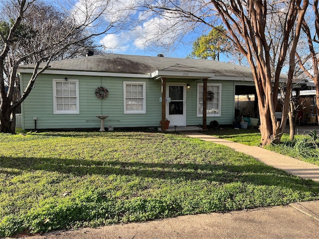 ranch-style house with a front lawn