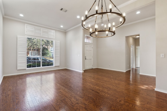 unfurnished room with dark wood-type flooring, a wealth of natural light, and ornamental molding