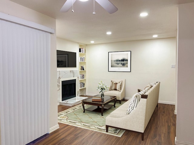 18333 Roehampton Dr Unit 813, Dallas, TX 75252 - living room with a ceiling fan, a fireplace, wood finished floors, baseboards, and recessed lighting