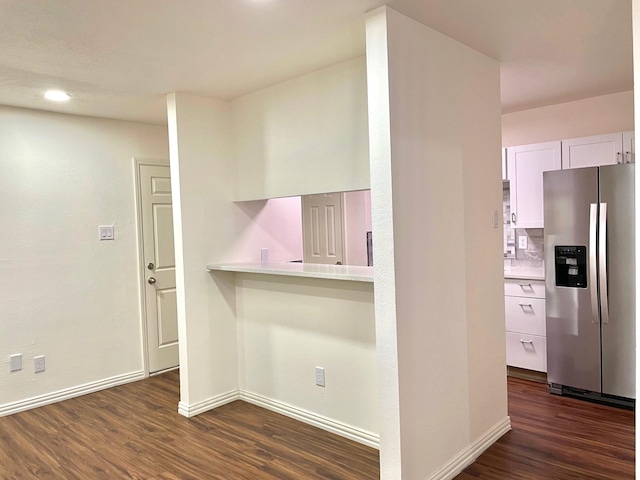 18333 Roehampton Dr Unit 813, Dallas, TX 75252 - kitchen featuring light countertops, white cabinetry, stainless steel fridge, baseboards, and dark wood-style flooring