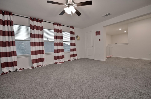 carpeted empty room with ceiling fan