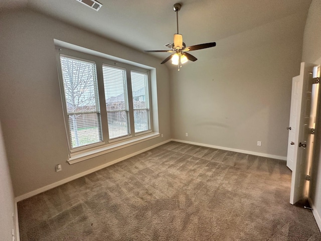 empty room featuring carpet flooring and ceiling fan