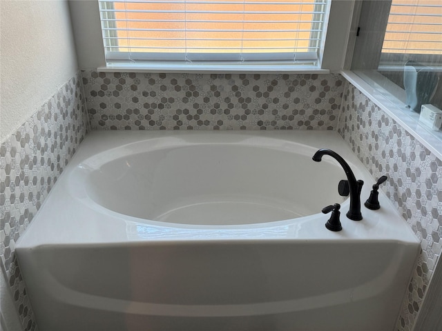 bathroom with a bathing tub